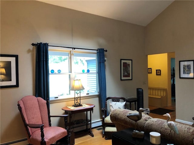 2 Marywood Ln, Cumberland, RI 02864 - bedroom featuring a baseboard radiator, light wood-style flooring, and high vaulted ceiling