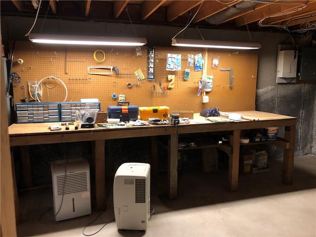 2 Marywood Ln, Cumberland, RI 02864 - below grade area with a workshop area and electric panel