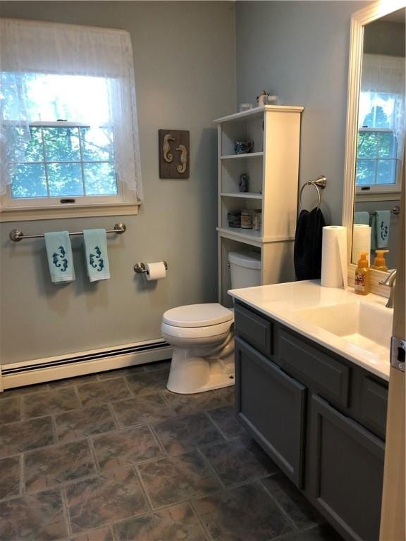 2 Marywood Ln, Cumberland, RI 02864 - bathroom featuring a baseboard heating unit and vanity