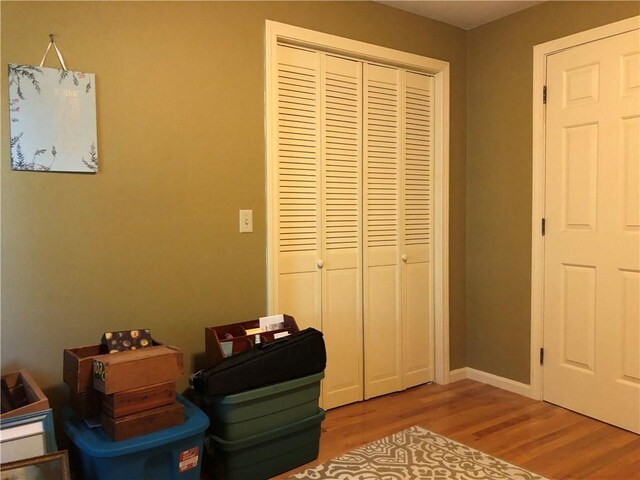 2 Marywood Ln, Cumberland, RI 02864 - bedroom with light wood-style floors and a closet