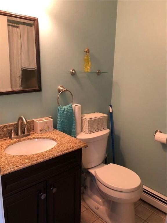 2 Marywood Ln, Cumberland, RI 02864 - bathroom with a baseboard heating unit, tile patterned flooring, and vanity