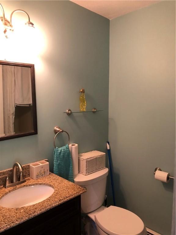2 Marywood Ln, Cumberland, RI 02864 - bathroom with vanity and toilet