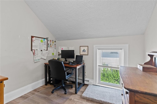 57 Maple Ave, Johnston, RI 02919 - office area featuring a textured ceiling, wood finished floors, a baseboard heating unit, and vaulted ceiling