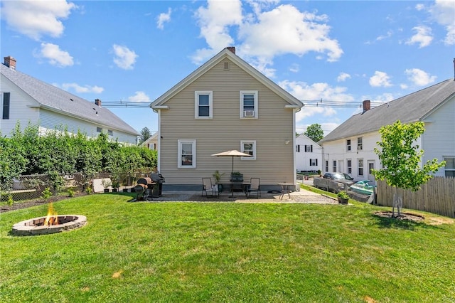 57 Maple Ave, Johnston, RI 02919 - back of house featuring an outdoor fire pit and a patio