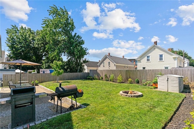 57 Maple Ave, Johnston, RI 02919 - fenced backyard with a fire pit