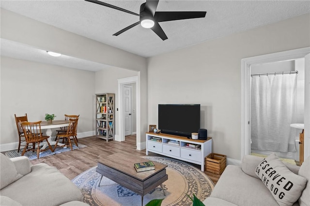 57 Maple Ave, Johnston, RI 02919 - living room with ceiling fan and light wood-style flooring