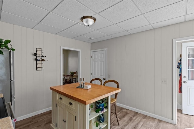 57 Maple Ave, Johnston, RI 02919 - dining space with light wood-style floors and a paneled ceiling