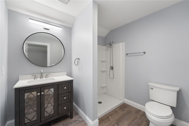 1 Lily Ln Unit 1, West Warwick, RI 02893 - bathroom featuring wood finished floors, vanity, a shower, and lofted ceiling