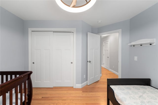1 Lily Ln Unit 1, West Warwick, RI 02893 - bedroom with light wood-style flooring and a closet