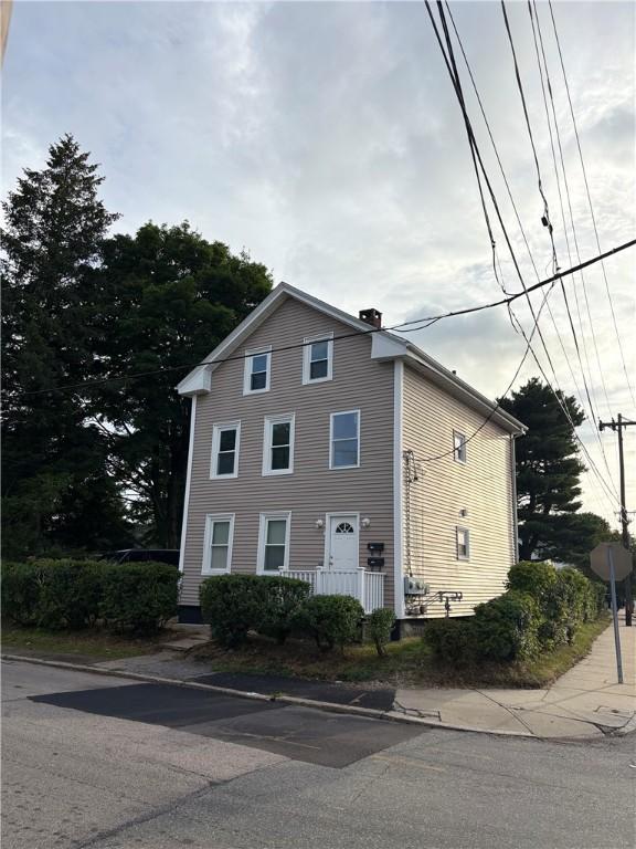 784 York Ave, Pawtucket, RI 02861 - view of front of property with a chimney