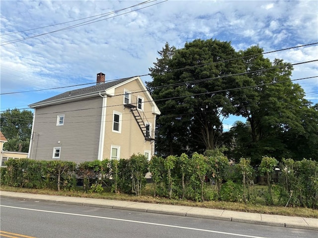 784 York Ave, Pawtucket, RI 02861 - view of home's exterior with a chimney