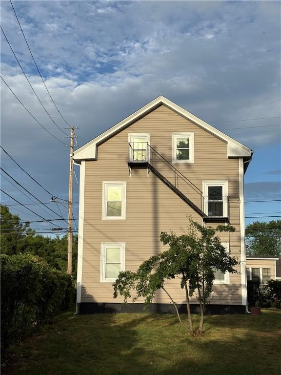 784 York Ave, Pawtucket, RI 02861 - view of property exterior with a lawn