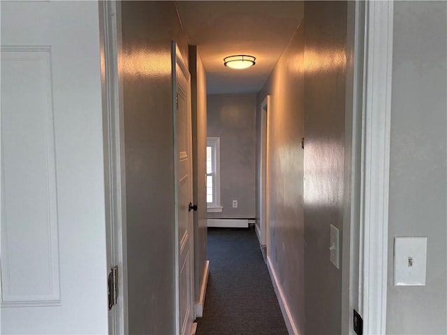 784 York Ave, Pawtucket, RI 02861 - hall with a baseboard heating unit and dark colored carpet