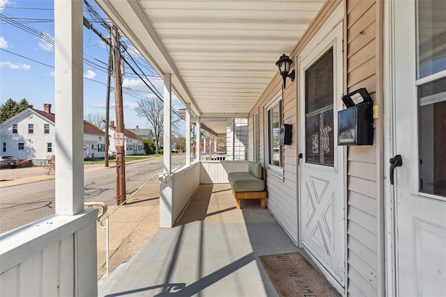 67 Pleasant St, Westerly, RI 02891 - covered porch featuring a residential view