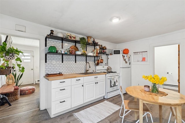67 Pleasant St, Westerly, RI 02891 - kitchen featuring white appliances, wood counters, dark wood finished floors, white cabinets, and ornamental molding