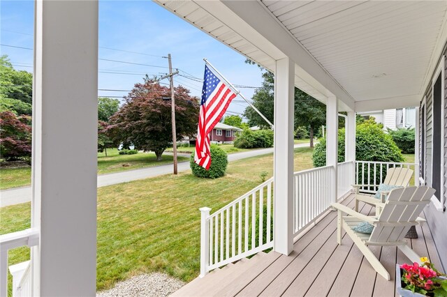 15 Mathew Rd, Tiverton, RI 02878 - wooden porch with a lawn