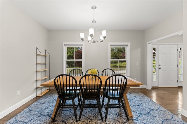 15 Mathew Rd, Tiverton, RI 02878 - dining space featuring a chandelier and dark wood-type flooring