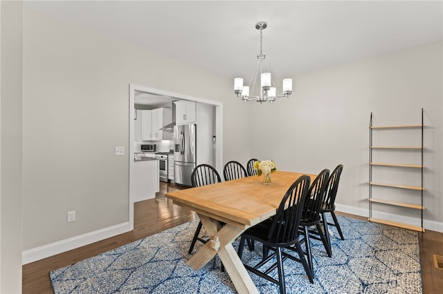 15 Mathew Rd, Tiverton, RI 02878 - dining space featuring a chandelier and dark wood-style flooring