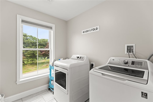 15 Mathew Rd, Tiverton, RI 02878 - laundry room featuring washer and clothes dryer and healthy amount of natural light