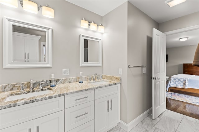 15 Mathew Rd, Tiverton, RI 02878 - ensuite bathroom with marble look tile flooring and double vanity
