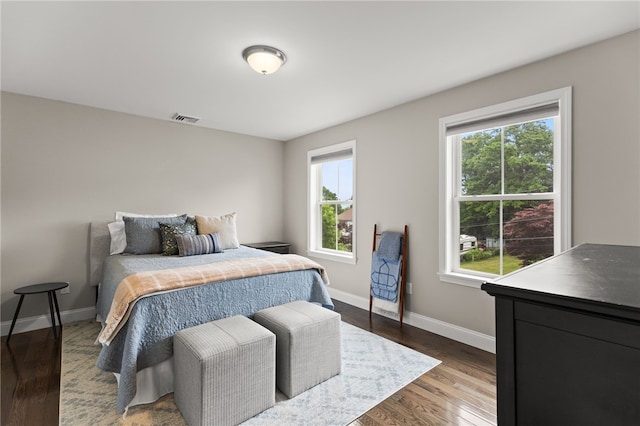 15 Mathew Rd, Tiverton, RI 02878 - bedroom featuring multiple windows and dark wood-style flooring