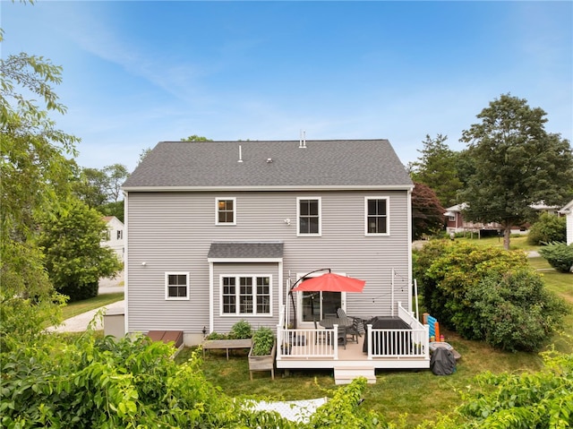 15 Mathew Rd, Tiverton, RI 02878 - rear view of house featuring a deck and a shingled roof