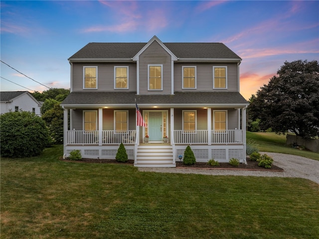 15 Mathew Rd, Tiverton, RI 02878 - view of front of house featuring covered porch, a yard, and a shingled roof