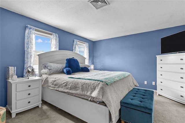 47 Morgan Ave Unit 61, Johnston, RI 02919 - carpeted bedroom with a textured ceiling