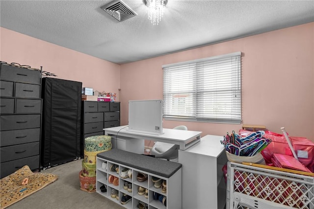 47 Morgan Ave Unit 61, Johnston, RI 02919 - bedroom with a textured ceiling, carpet, a desk, and refrigerator