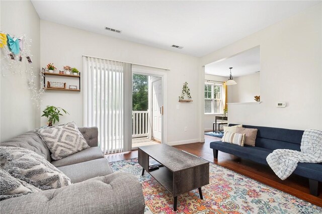 112 Mill St Unit 203, Woonsocket, RI 02895 - living area with wood finished floors and baseboards