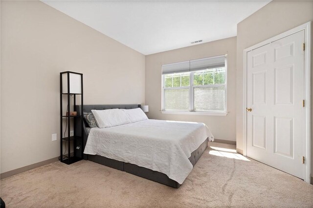112 Mill St Unit 203, Woonsocket, RI 02895 - bedroom featuring carpet floors and baseboards