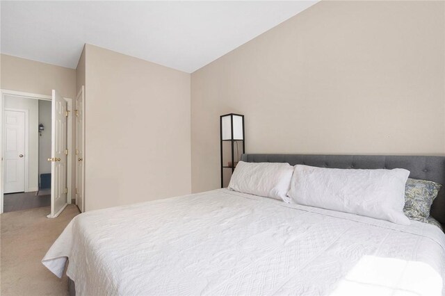 112 Mill St Unit 203, Woonsocket, RI 02895 - bedroom featuring carpet floors and lofted ceiling