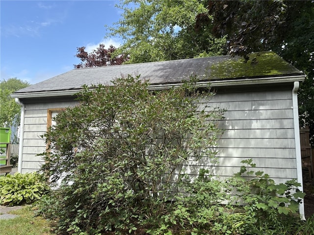 10 Jesse Davis Ln, Barrington, RI 02806 - view of side of home featuring a shingled roof