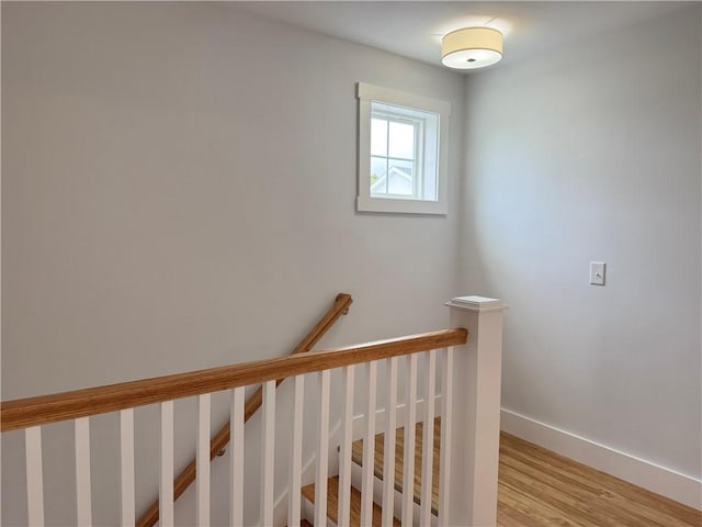 5 Crawford St, West Warwick, RI 02893 - stairway featuring wood finished floors and baseboards