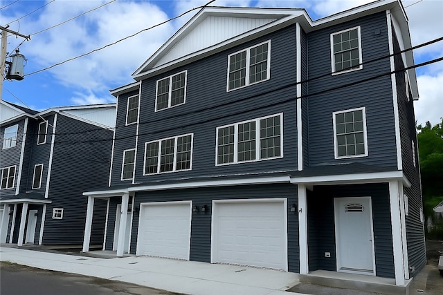 5 Crawford St, West Warwick, RI 02893 - view of front of home featuring an attached garage