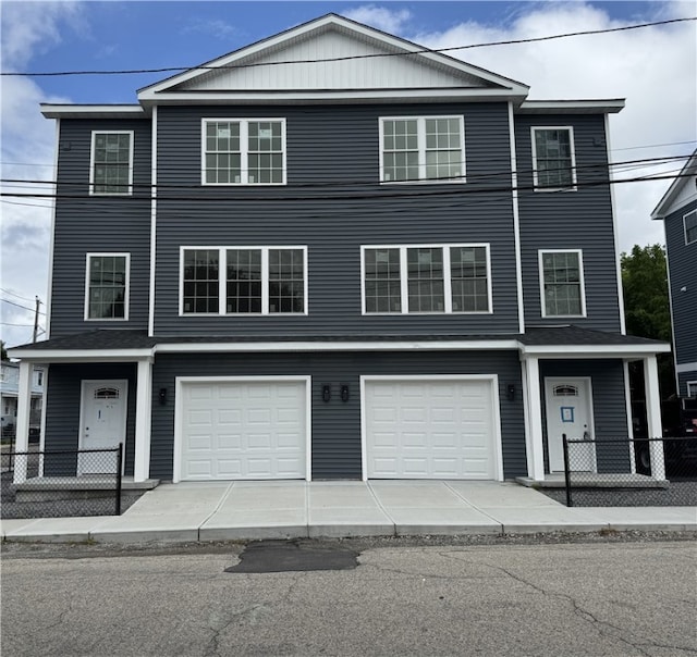 5 Crawford St, West Warwick, RI 02893 - view of front of house featuring an attached garage