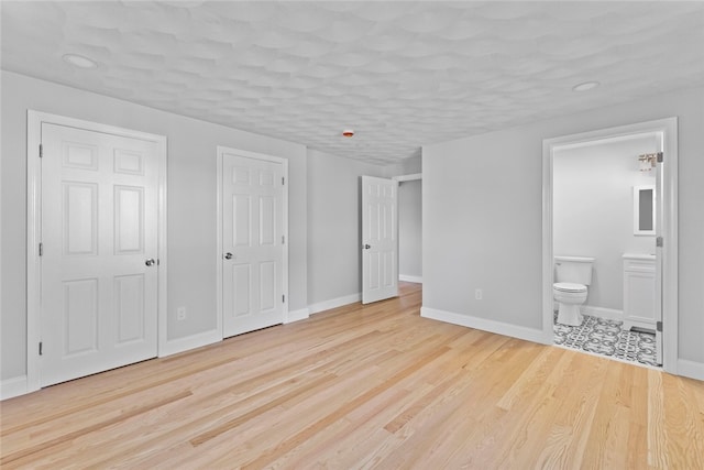 3 Riverview Ave, Westerly, RI 02891 - unfurnished bedroom with light wood-style flooring, ensuite bathroom, and recessed lighting