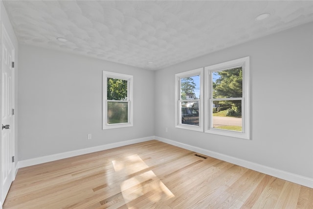 3 Riverview Ave, Westerly, RI 02891 - empty room with baseboards and light wood-style flooring