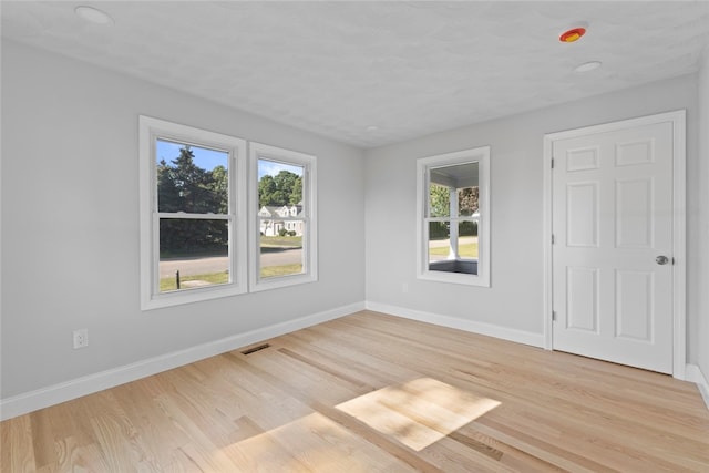 3 Riverview Ave, Westerly, RI 02891 - unfurnished room featuring plenty of natural light, light wood-style flooring, a smoke detector, and recessed lighting