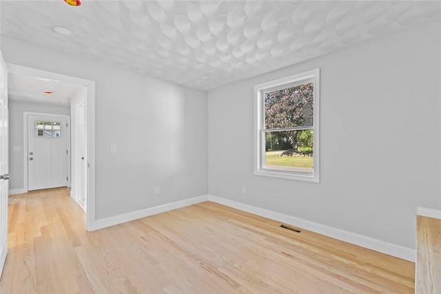 3 Riverview Ave, Westerly, RI 02891 - empty room featuring light wood-style floors and baseboards