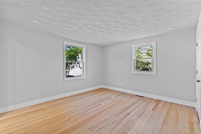 3 Riverview Ave, Westerly, RI 02891 - spare room featuring healthy amount of natural light and light wood-type flooring