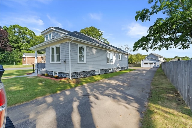 3 Riverview Ave, Westerly, RI 02891 - view of property exterior with an outdoor structure and a detached garage
