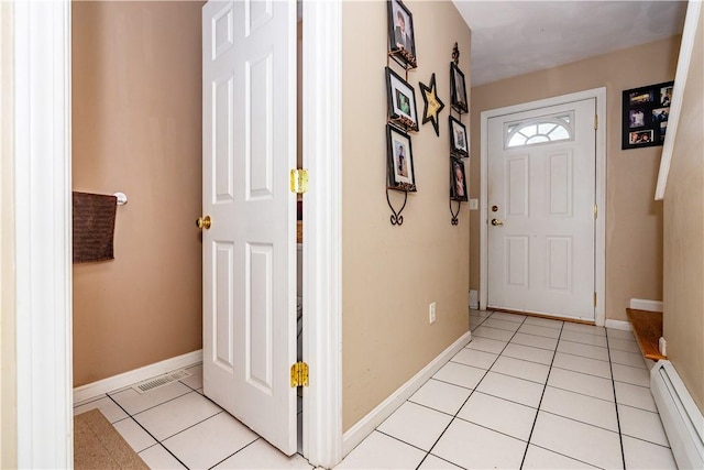 65 Jeri Lynn Cir, Warwick, RI 02886 - foyer featuring a baseboard radiator and light tile patterned flooring