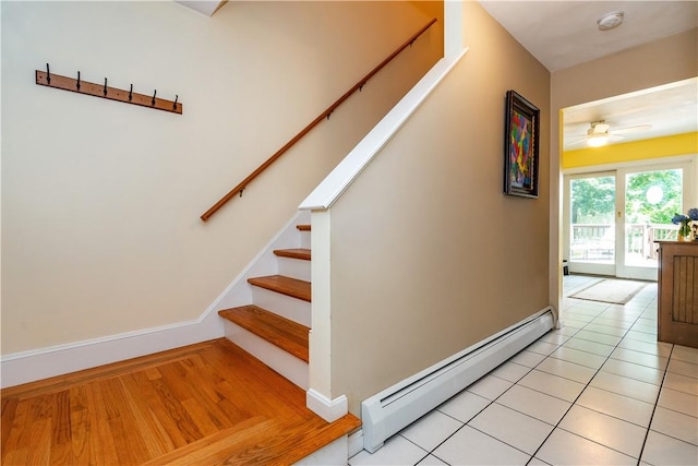 65 Jeri Lynn Cir, Warwick, RI 02886 - staircase featuring baseboard heating, ceiling fan, and tile patterned floors
