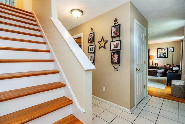 65 Jeri Lynn Cir, Warwick, RI 02886 - stairway featuring tile patterned flooring and baseboards