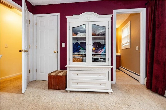 65 Jeri Lynn Cir, Warwick, RI 02886 - hall featuring a baseboard radiator and light colored carpet
