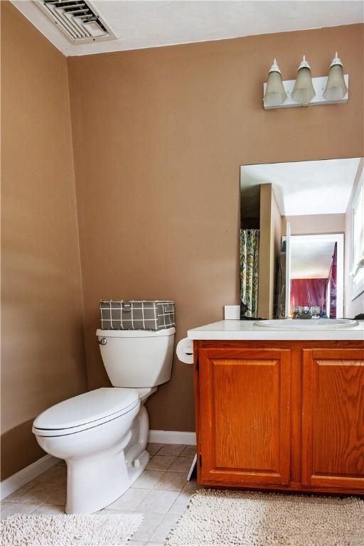 65 Jeri Lynn Cir, Warwick, RI 02886 - full bath featuring vanity and tile patterned flooring