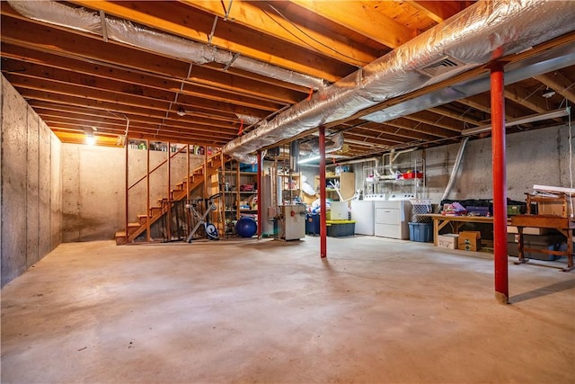 65 Jeri Lynn Cir, Warwick, RI 02886 - unfinished below grade area featuring washer and clothes dryer and stairway