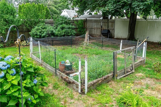 65 Jeri Lynn Cir, Warwick, RI 02886 - fenced backyard with a vegetable garden