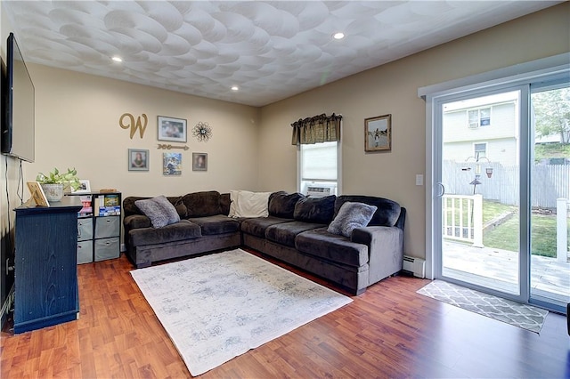 73 Fessenden St, Warwick, RI 02886 - living area with baseboard heating, light wood-type flooring, and recessed lighting